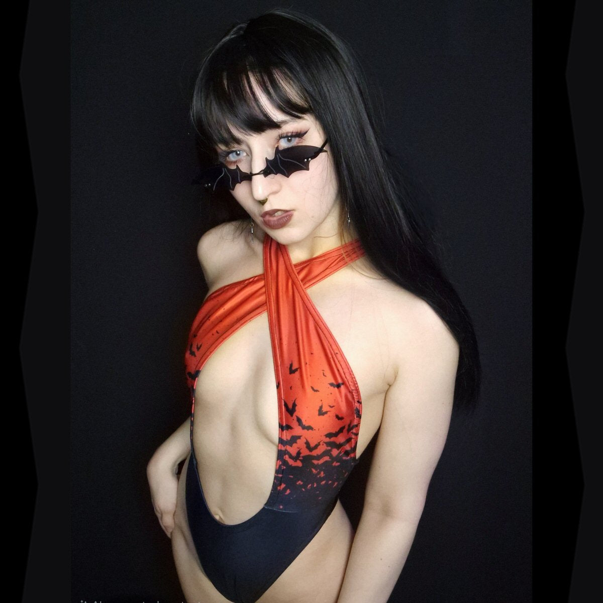 Vamp Hollowed-Out One-Piece Swimsuit