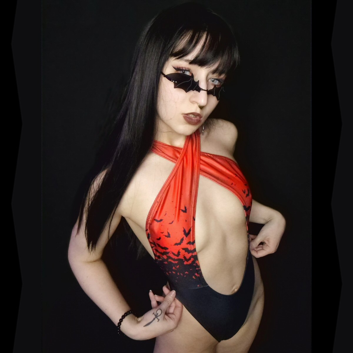Vamp Hollowed-Out One-Piece Swimsuit