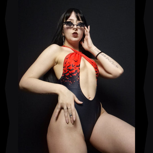 Vamp Hollowed-Out One-Piece Swimsuit
