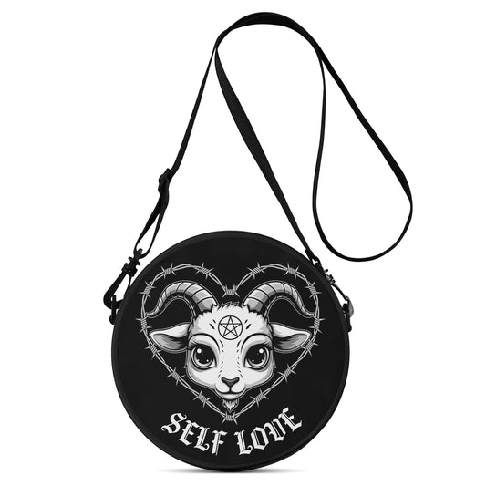 Black bag with a goat illustration and 'SELF LOVE' text on a white background